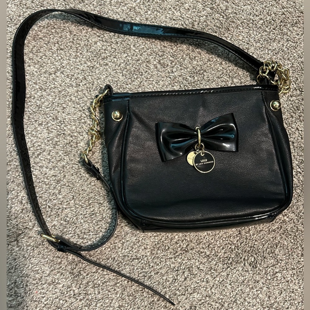 Lulu Guinness bow purse with gold and black patent accents 🎀